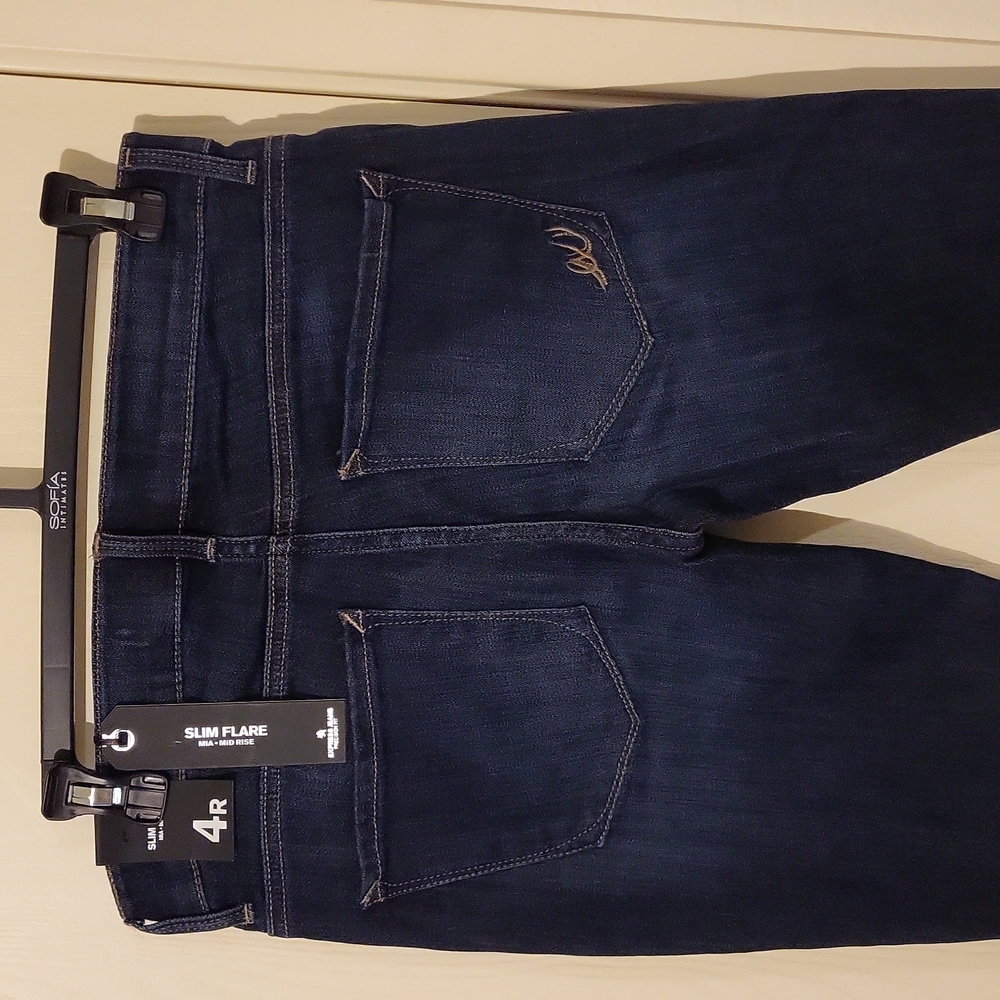 Express jeans size 4, mid rise slim flare, 15" waist across,  33" inseam.